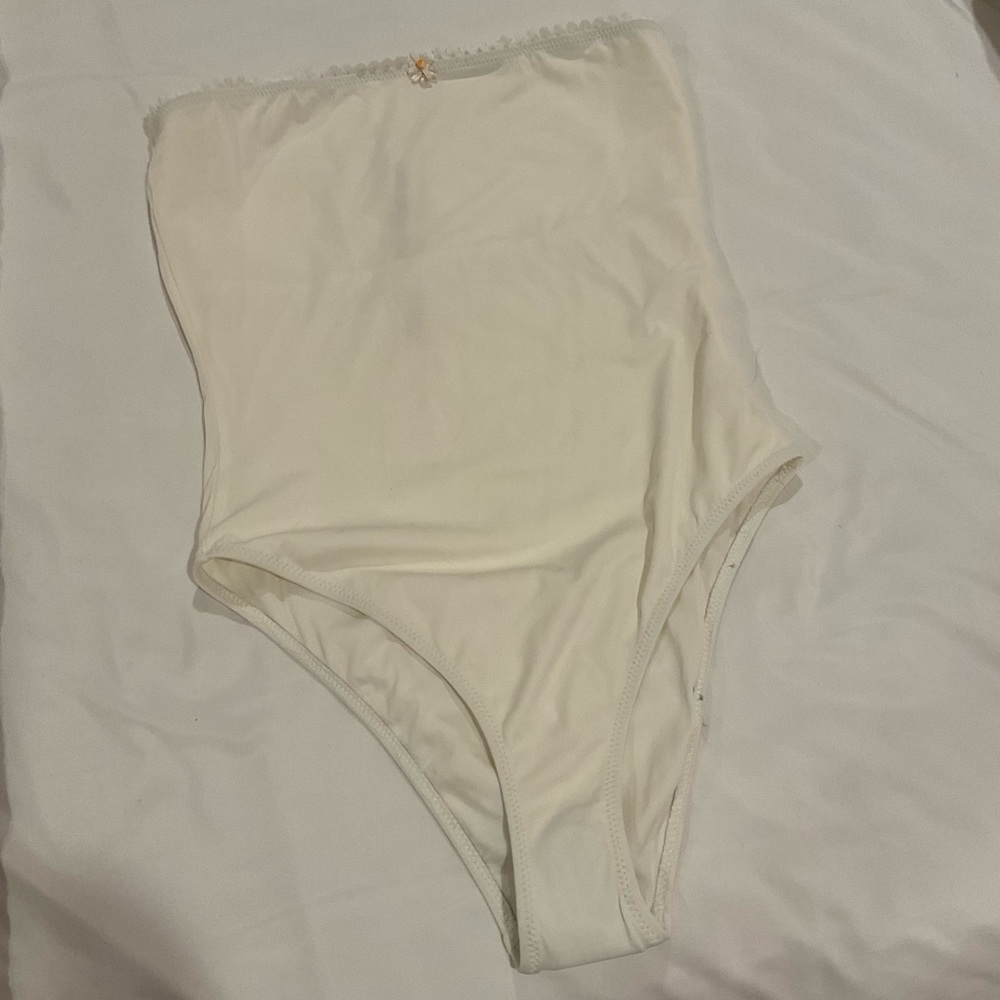 White solid and striped one piece